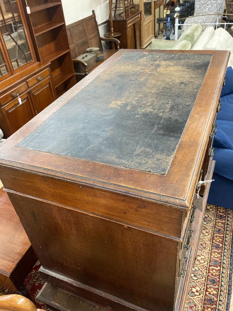 A late Victorian walnut kneehole desk, length 106cm, depth 60cm, height 74cm